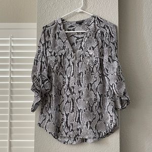 EXPRESS size M animal print blouse lightly worn